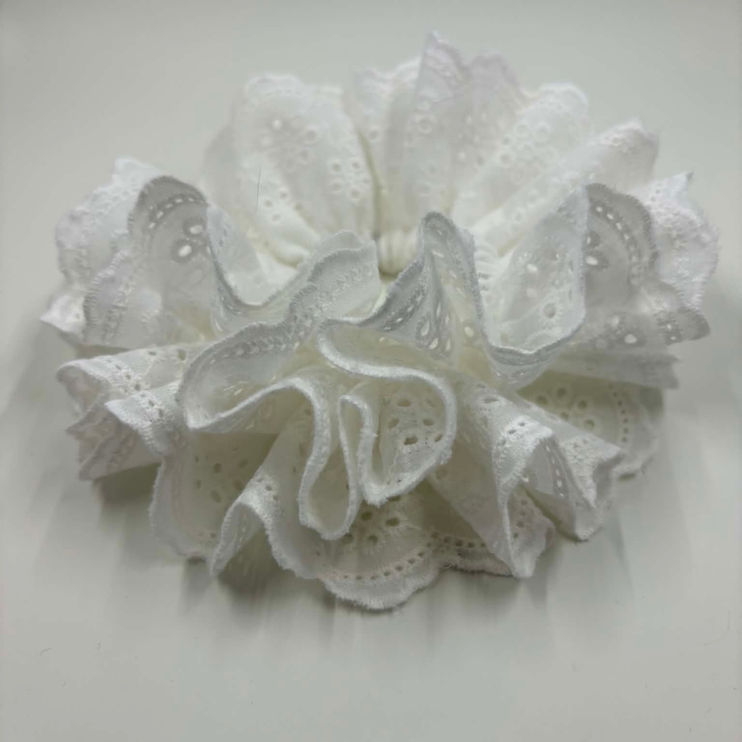 THE ISLA EYELET RUFFLED HAIR SCRUNCHIE