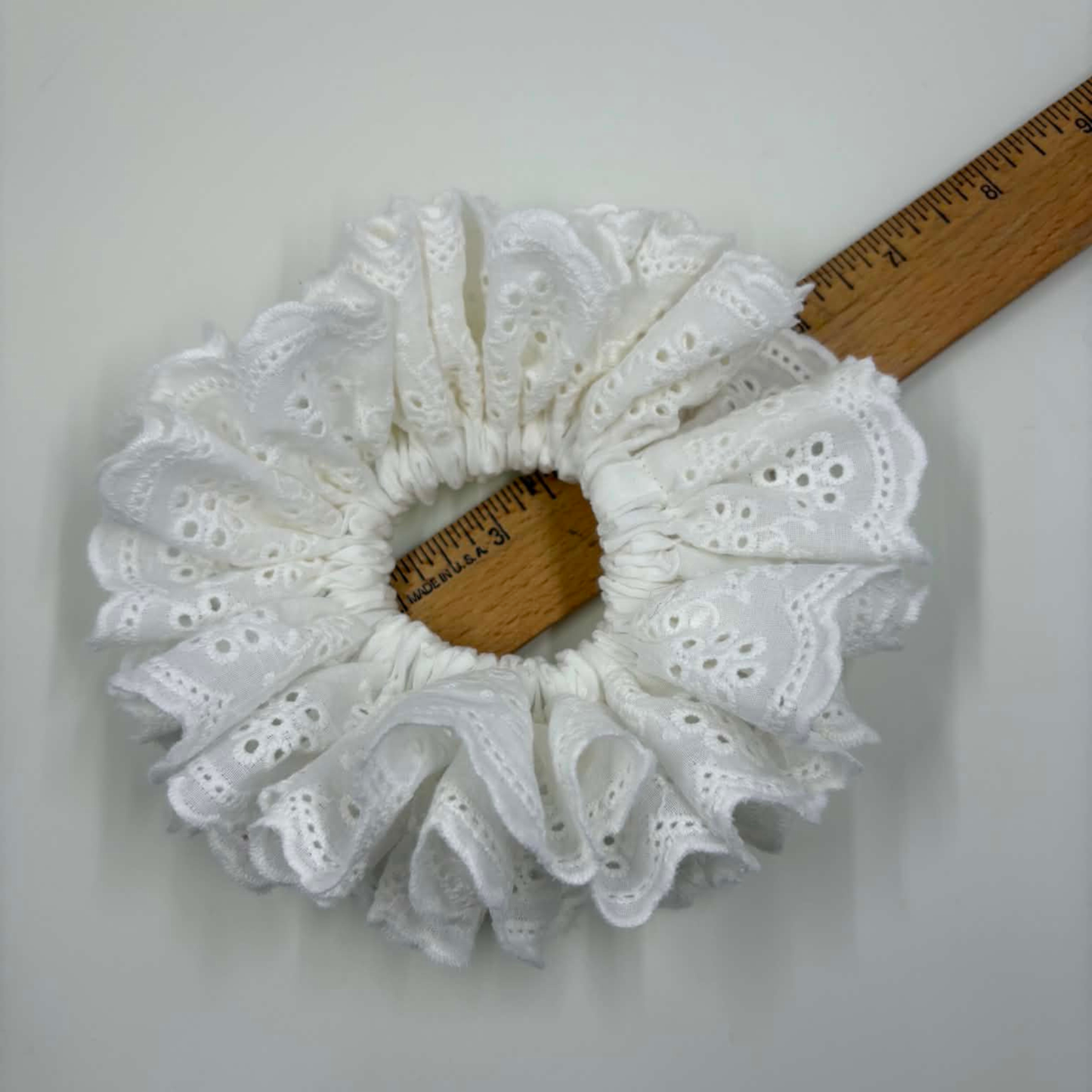 THE ISLA EYELET RUFFLED HAIR SCRUNCHIE