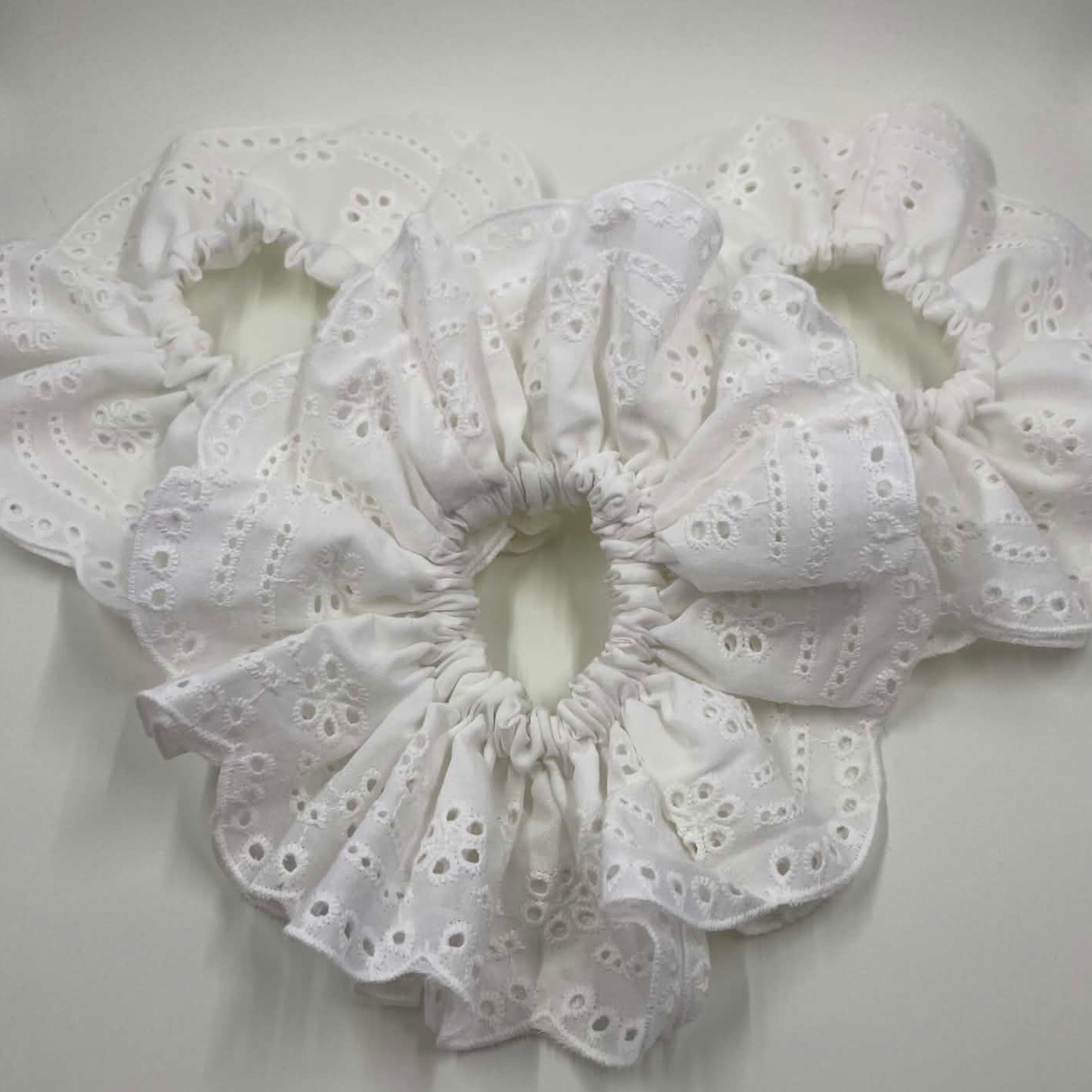 THE ELIZABETH EYELET RUFFLED HAIR SCRUNCHIE