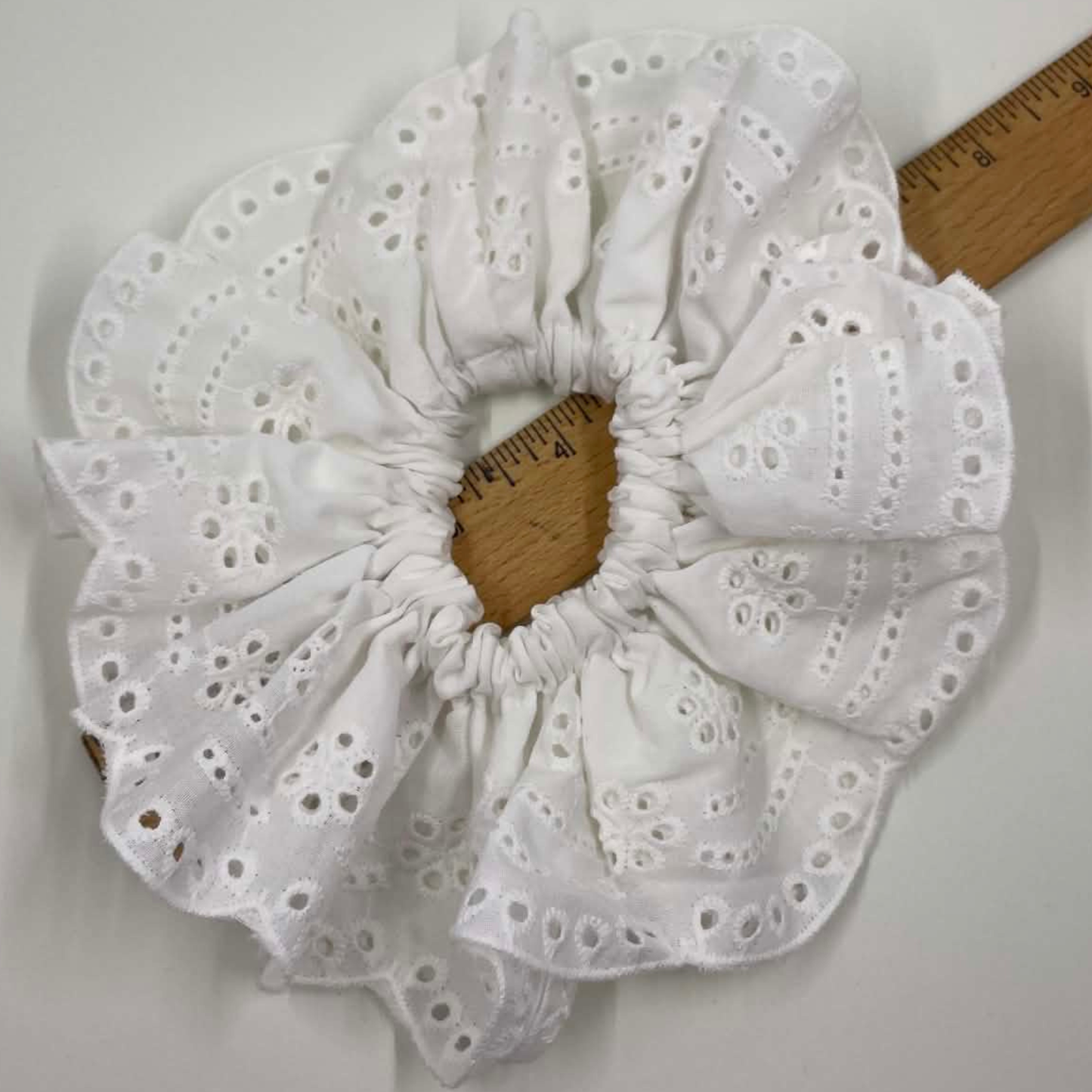 THE ELIZABETH EYELET RUFFLED HAIR SCRUNCHIE