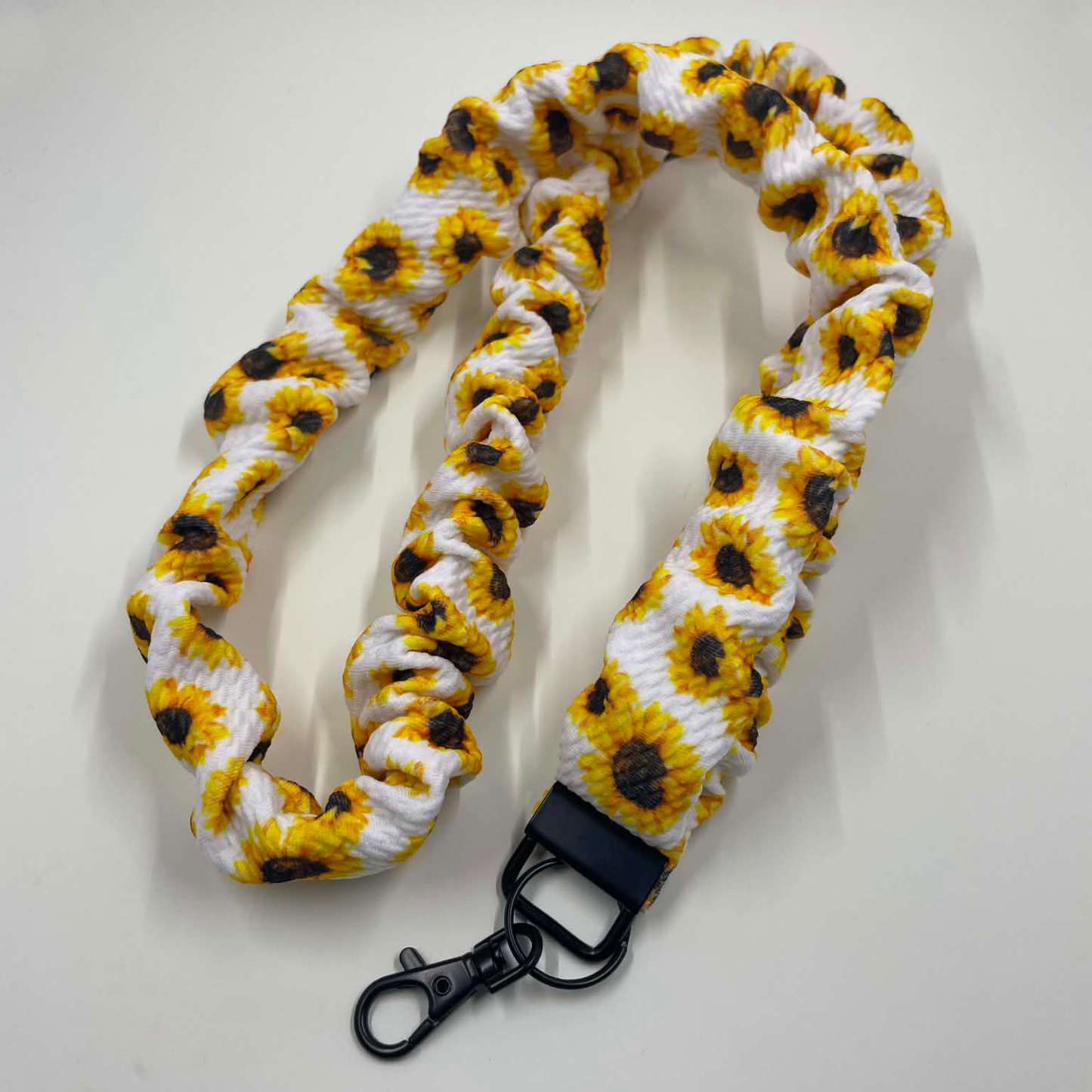 THE SUNFLOWER SCRUNCHIE LANYARD
