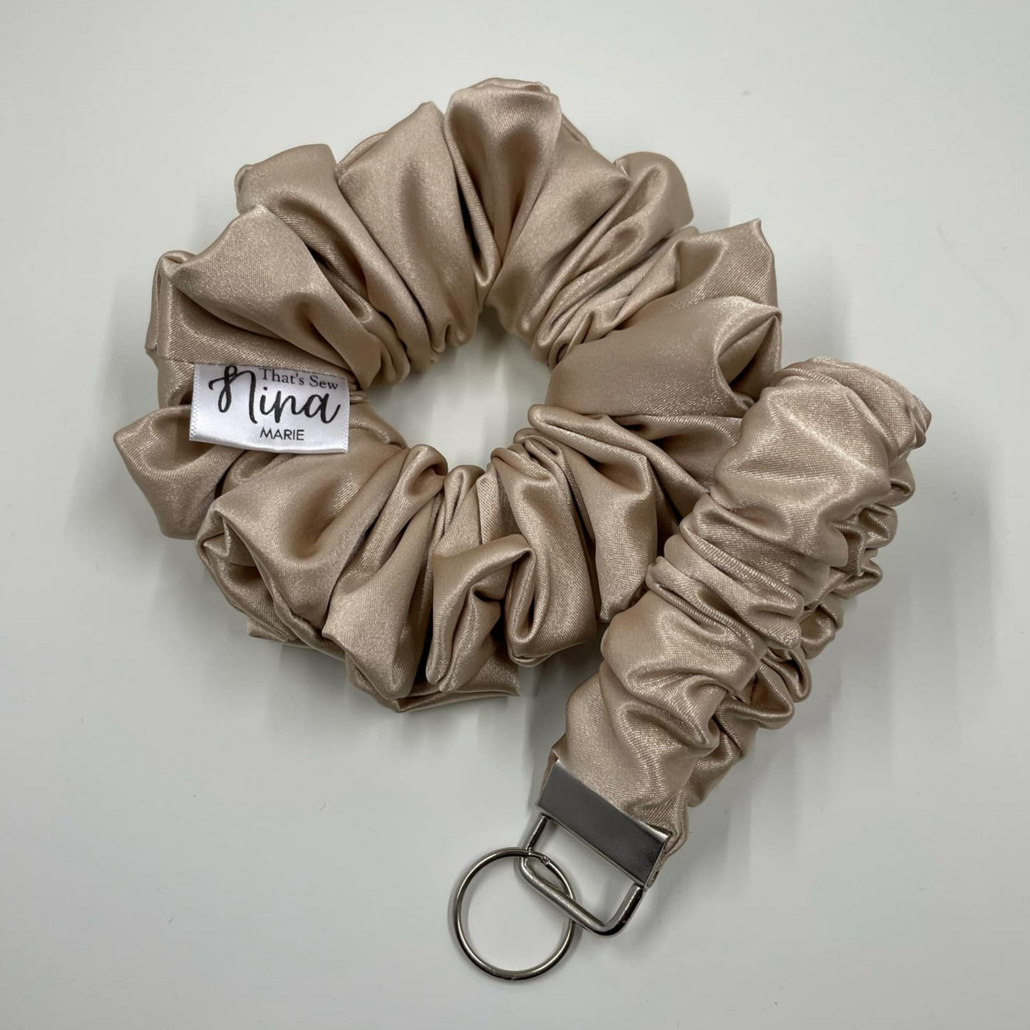 THE PROSECCO GOLD SATIN SCRUNCHIE KEYCHAIN